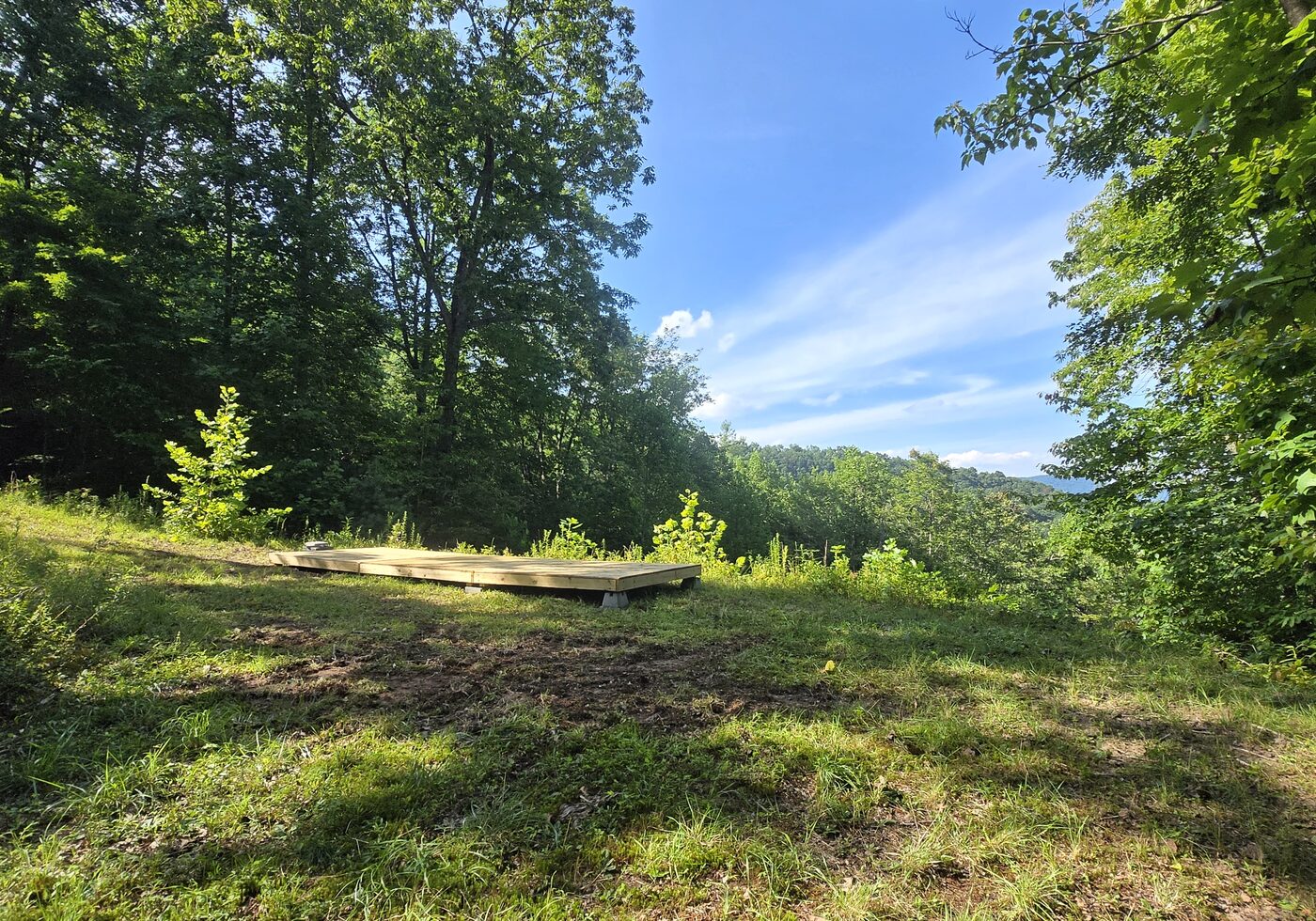 The three decks laid in a line at Arches 13, Cardinal Mountain Campground, forming an 8 by 24 platform