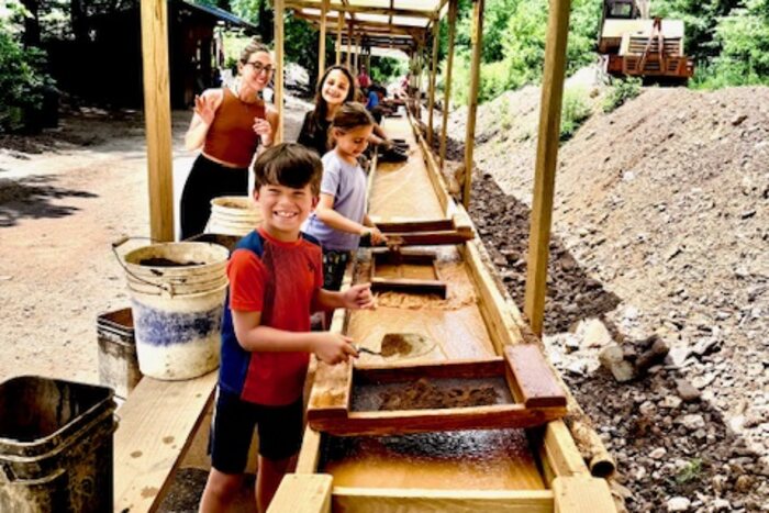 Sifting gravel for rubies and sapphires at a gem mine near Franklin, North Carolina